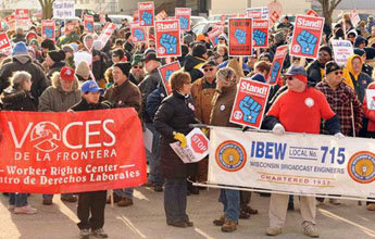 IBEW members rally with Machinists on strike.